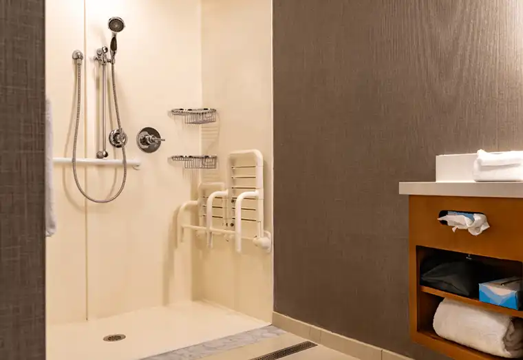 Perth NDIS Home modification bathroom with roll-in shower and grab rails